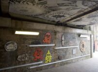Street art under a railway bridge near Brixton