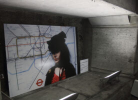 Abseilers installing art inside Westminster tube station