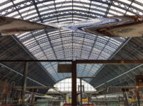 A spinning blade of polished steel in St Pancras