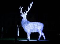 A glowing deer made from rubbish in central London