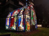 A glowing greenhouse of distorted stained glass