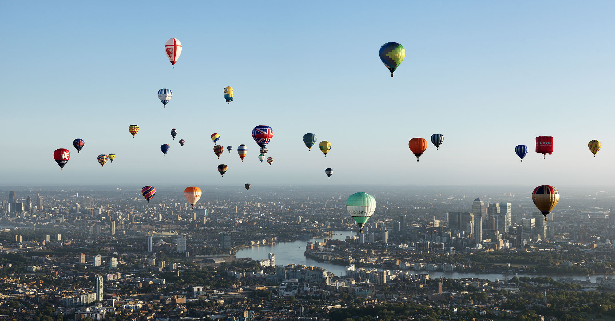 See hot air balloons drifting over central London