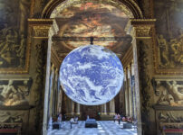 A glowing earth fills the Painted Hall in Greenwich