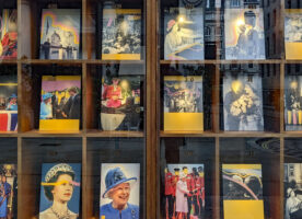 Photos of The Queen covered in pink and yellow paint