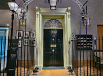 Have your photo taken in front of the 10 Downing Street door from The Crown