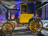 A 120 year old electric carriage goes on display at the Science Museum