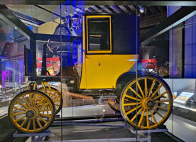 A 120 year old electric carriage goes on display at the Science Museum